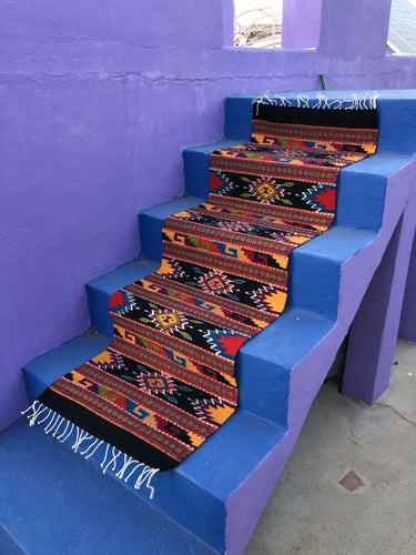 Handwoven Fiesta natural wool rug, made in Oaxaca Mexico.